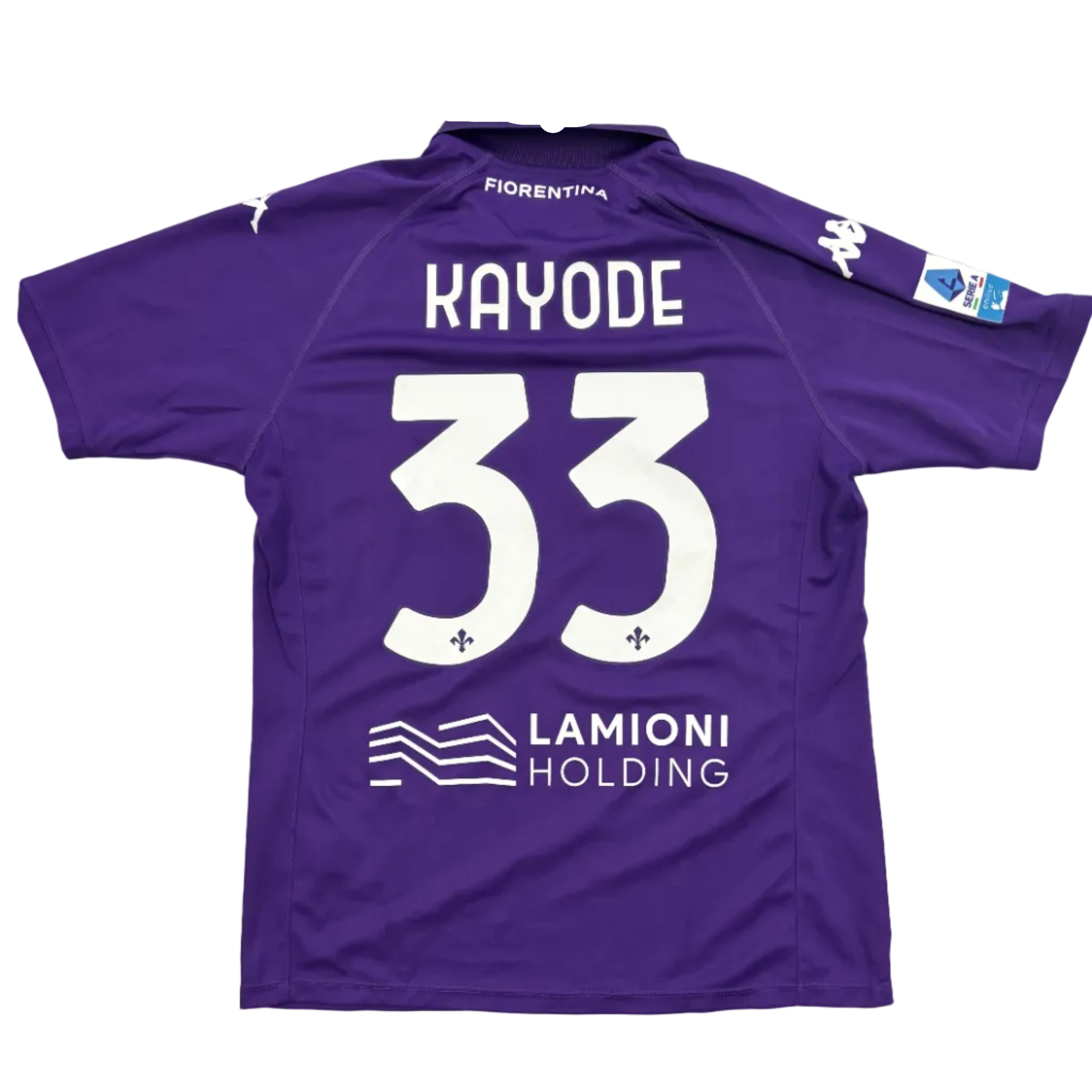 Purple sports jersey with 'Kayode 33' printed on it, displayed on a round white table.