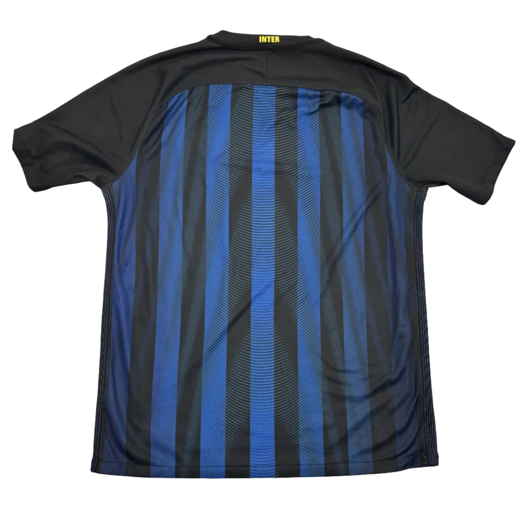 Black and blue striped sports jersey on a round surface