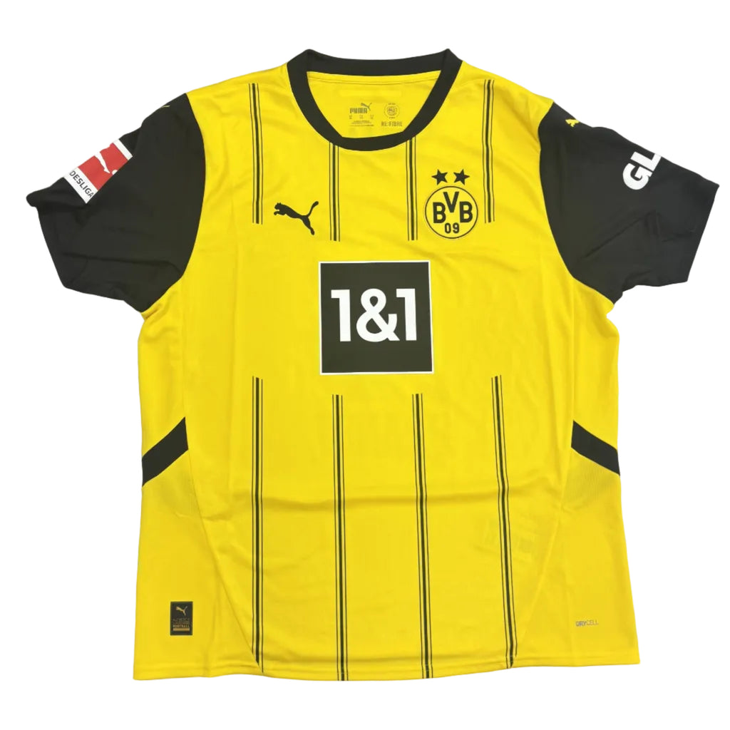 Yellow sports jersey with black accents on a gray surface