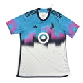 Colorful sports jersey with Adidas logo on a round table