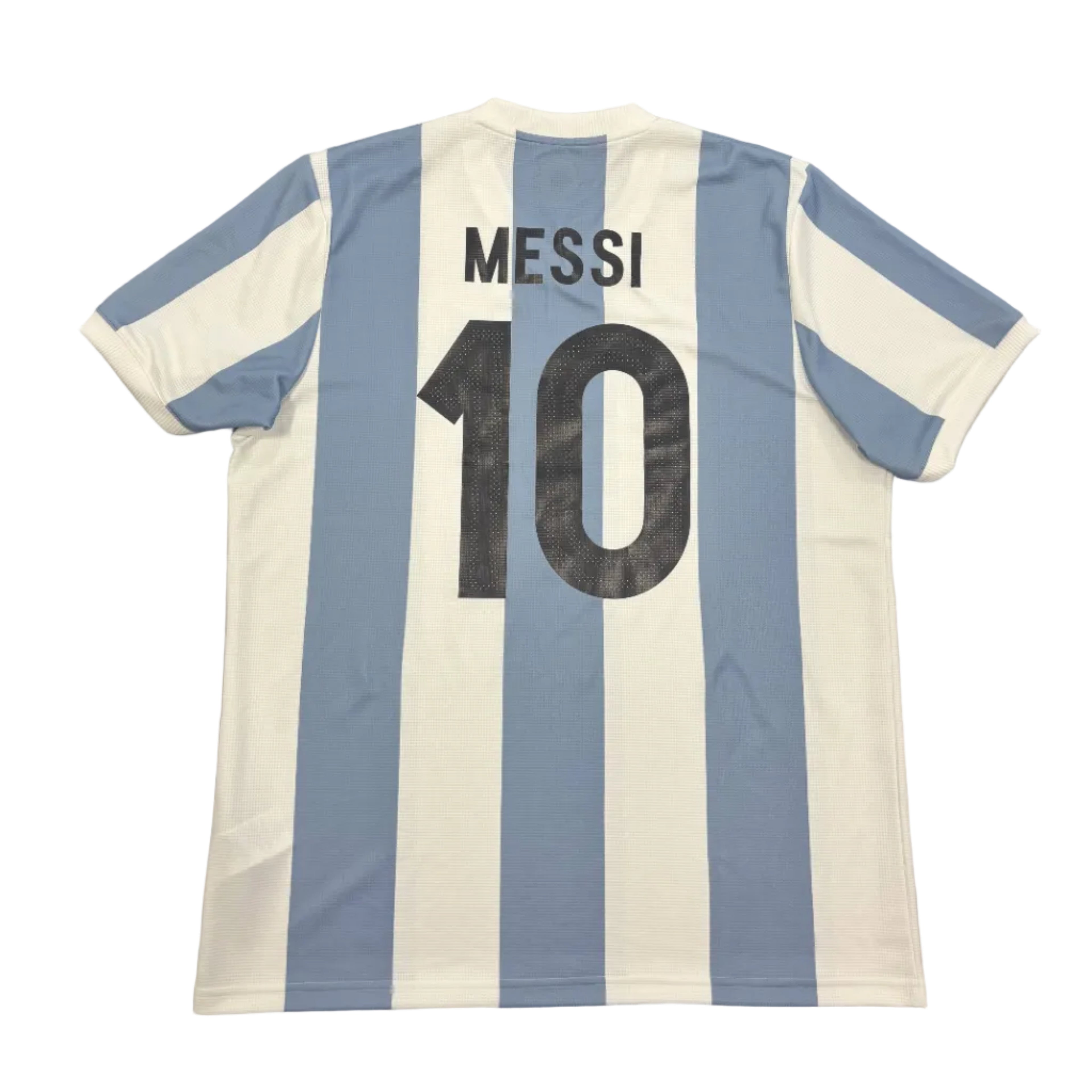 Blue and white striped sports jersey with 'Messi 10' on a round gray surface.