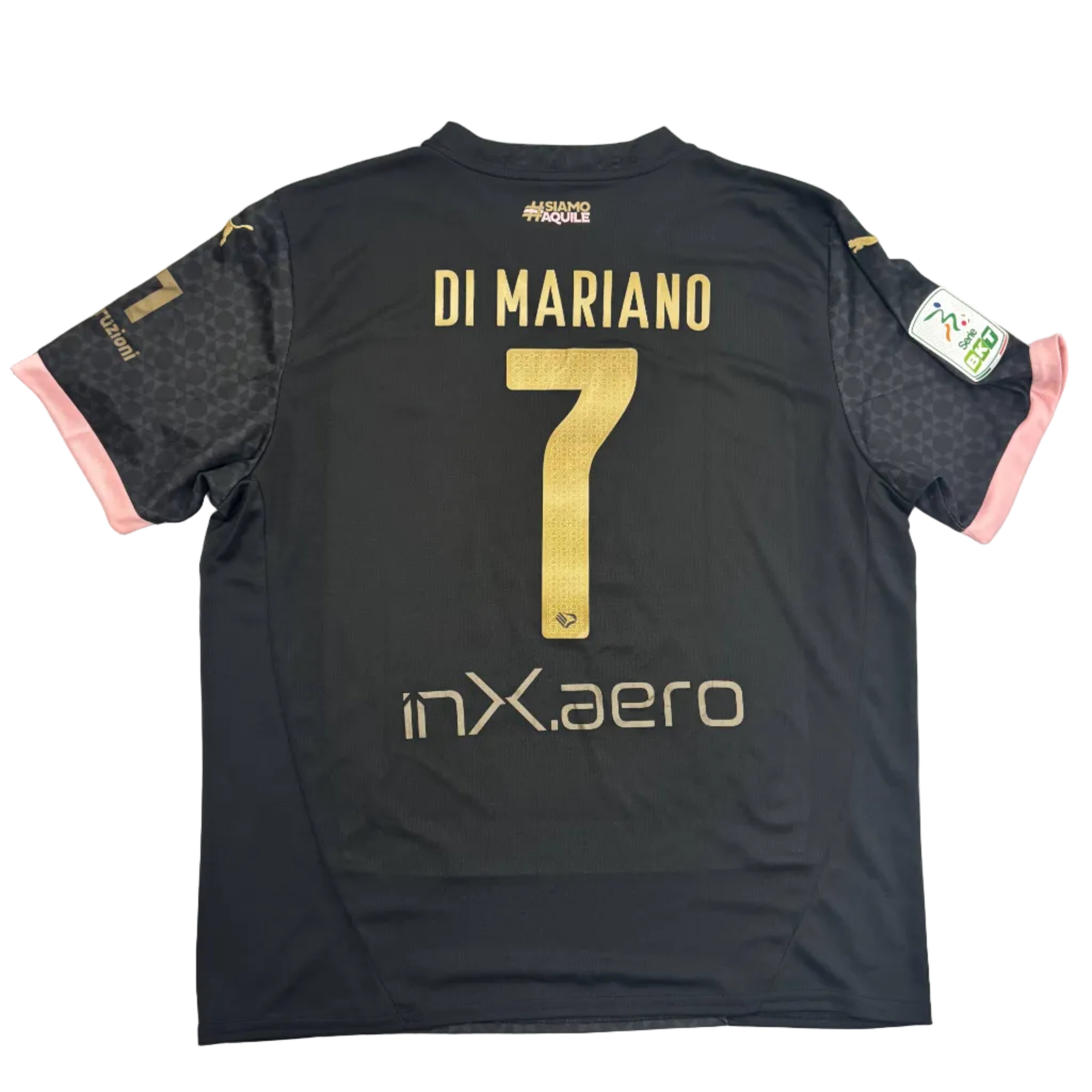 Black sports jersey with 'Di Mariano' and number '7' on a round table.