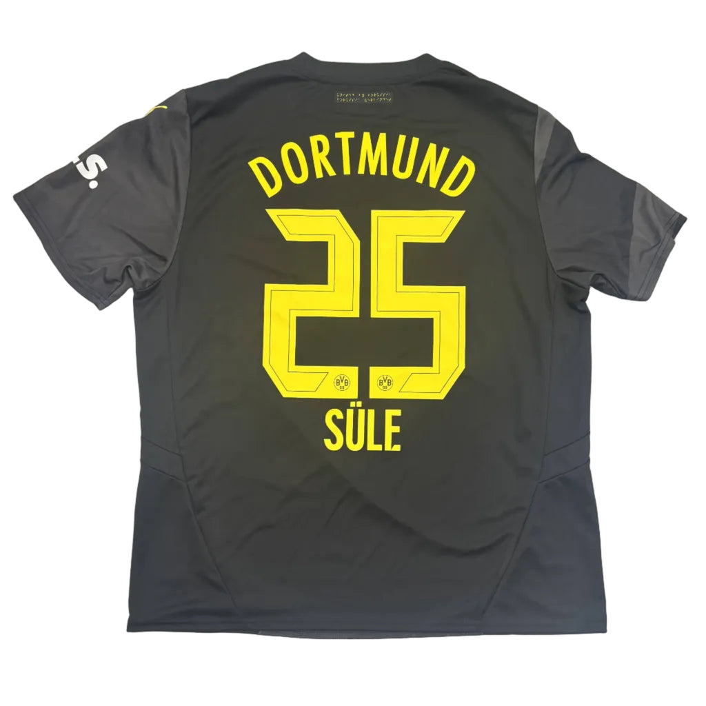 Black sports jersey with yellow text on a white surface