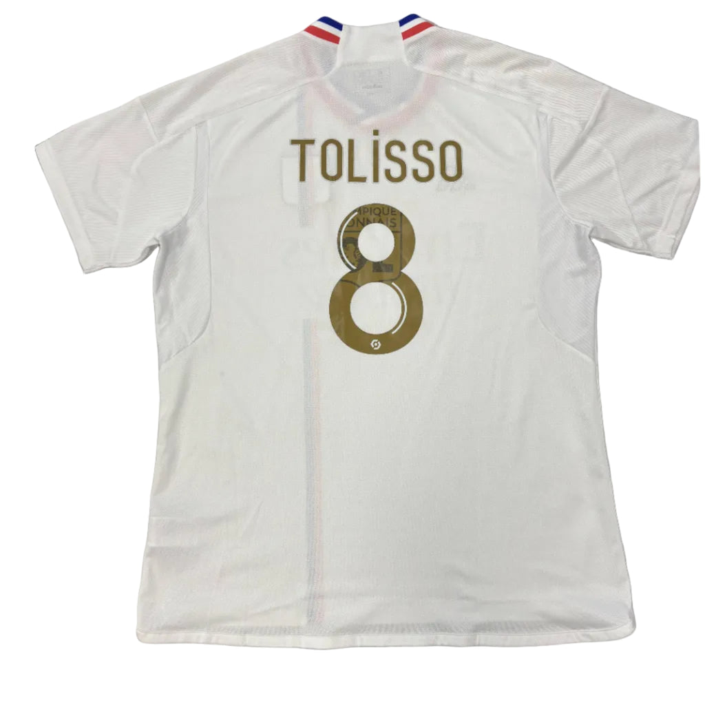 White sports jersey with 'Tolisso' and number '8' on a gray background