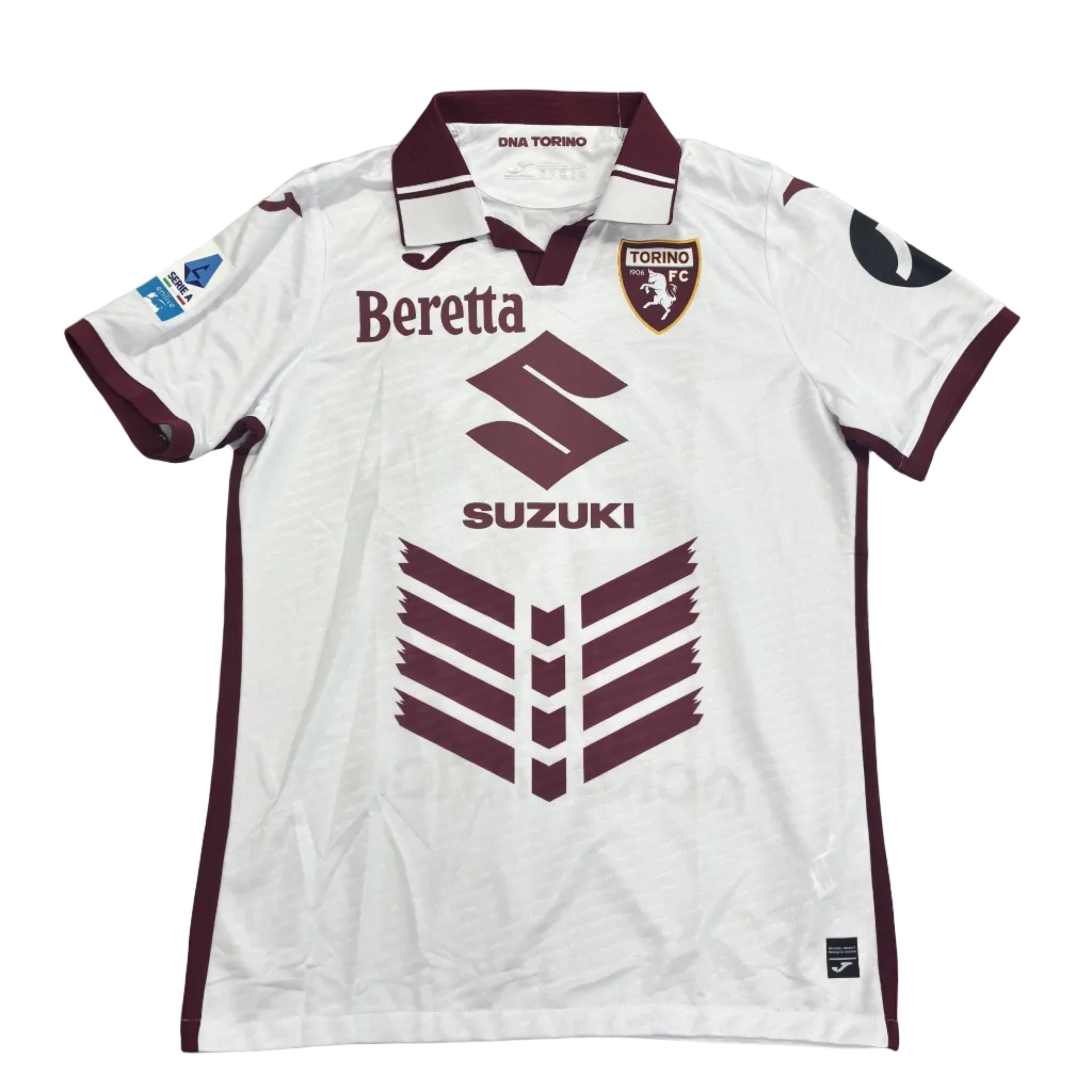 White sports jersey with maroon accents on a round table