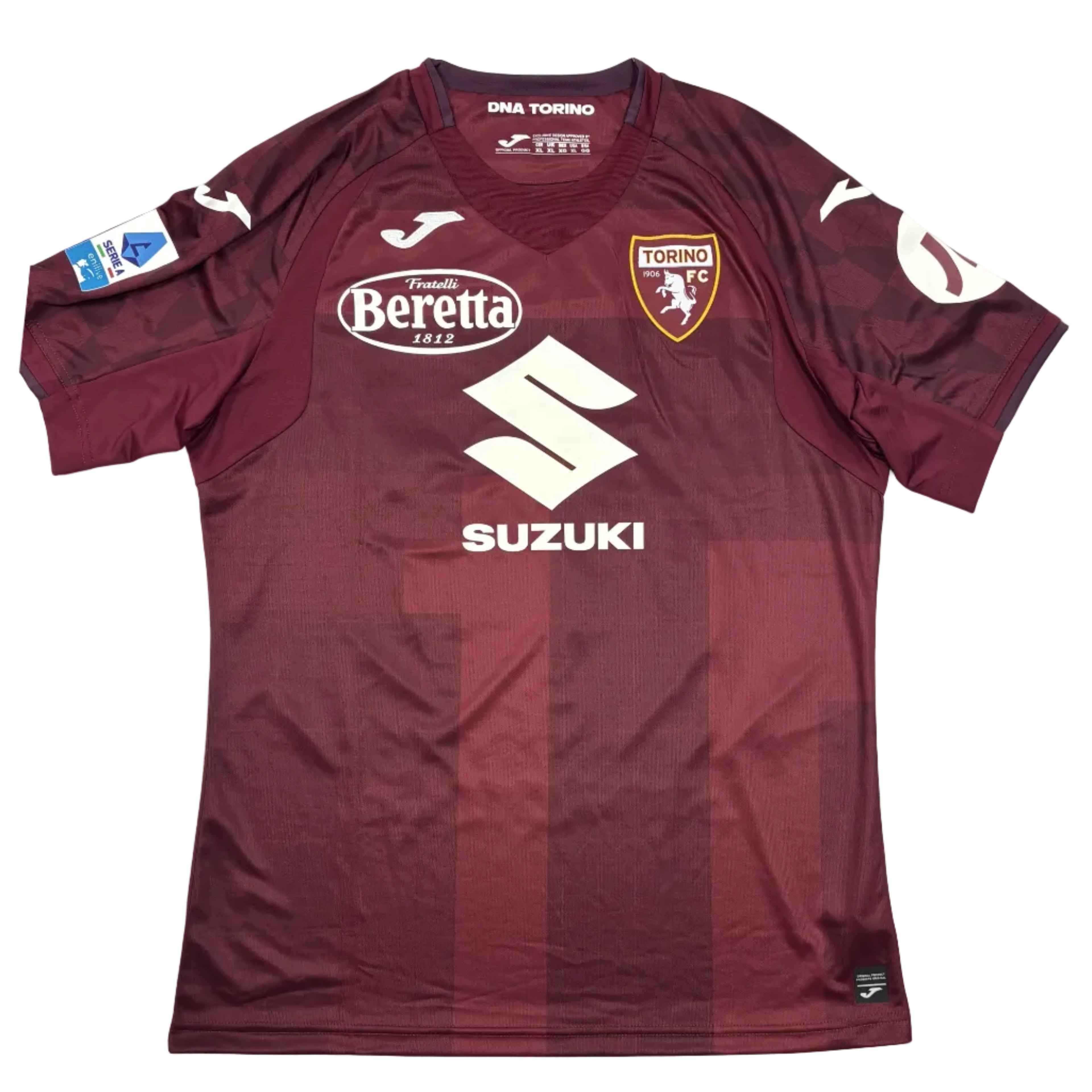 Maroon sports jersey with visible branding on a round white table.