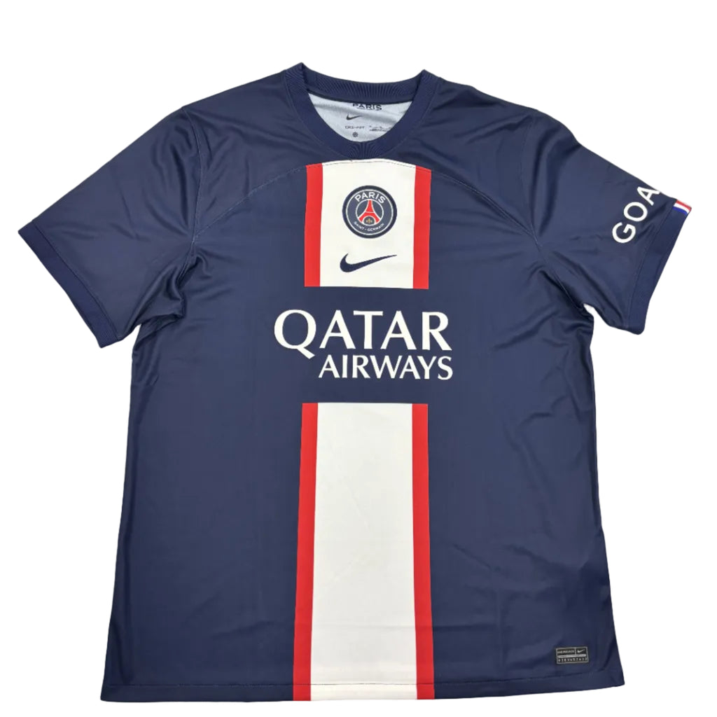 Blue sports jersey with Qatar Airways logo on a white surface